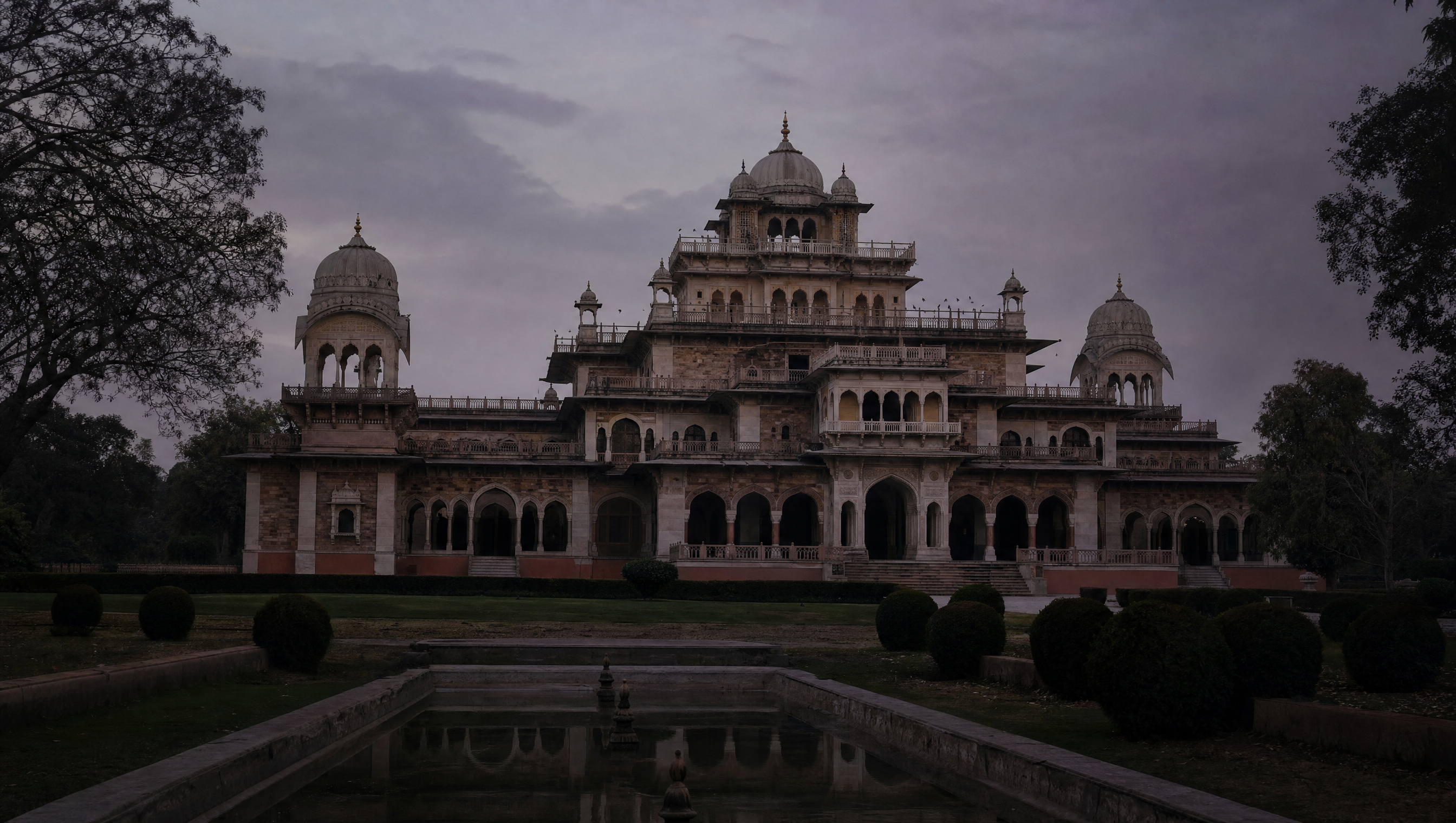 The Albert Hall Museum seen across the lawns of Ram Niwas Garden at dusk
