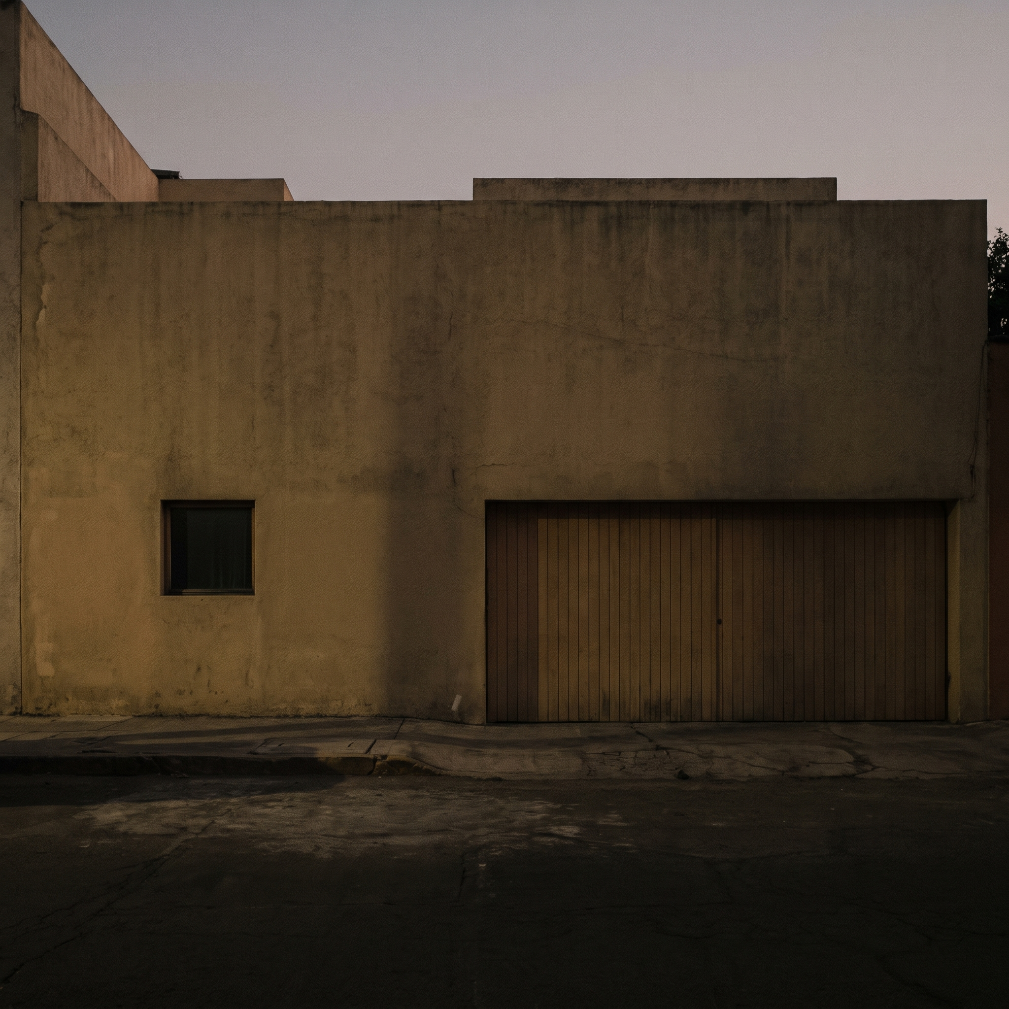 The street facade in the last of the light