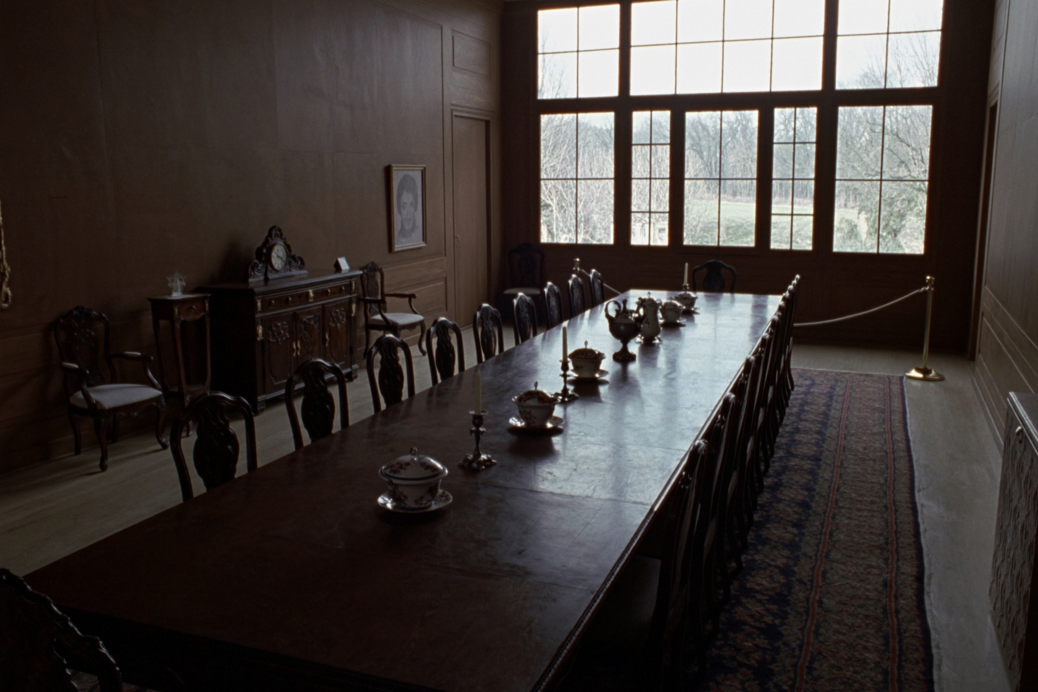 The dining room laid for a meal that will not be eaten