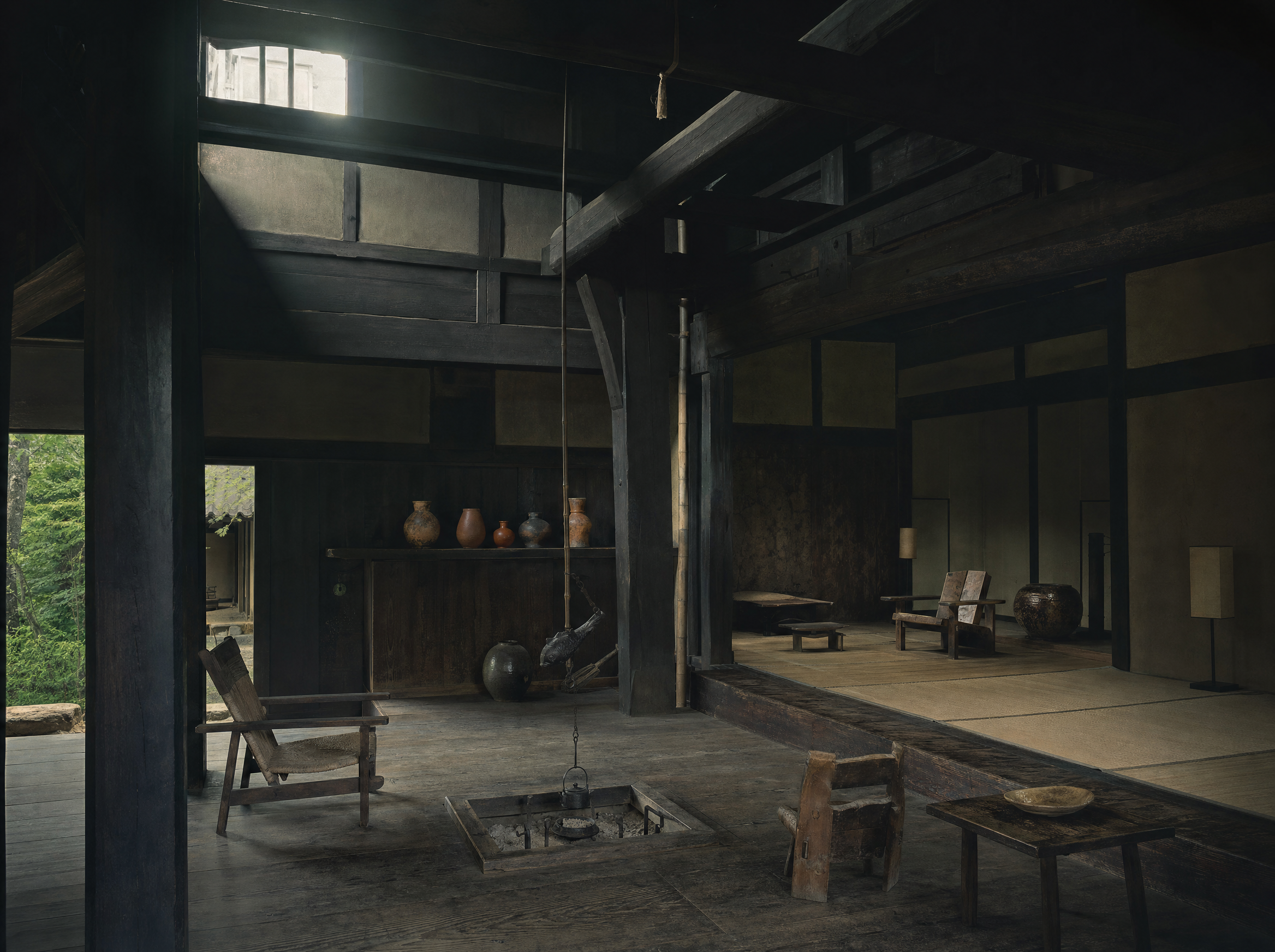 The living and working room, sunken hearth and blackened beams