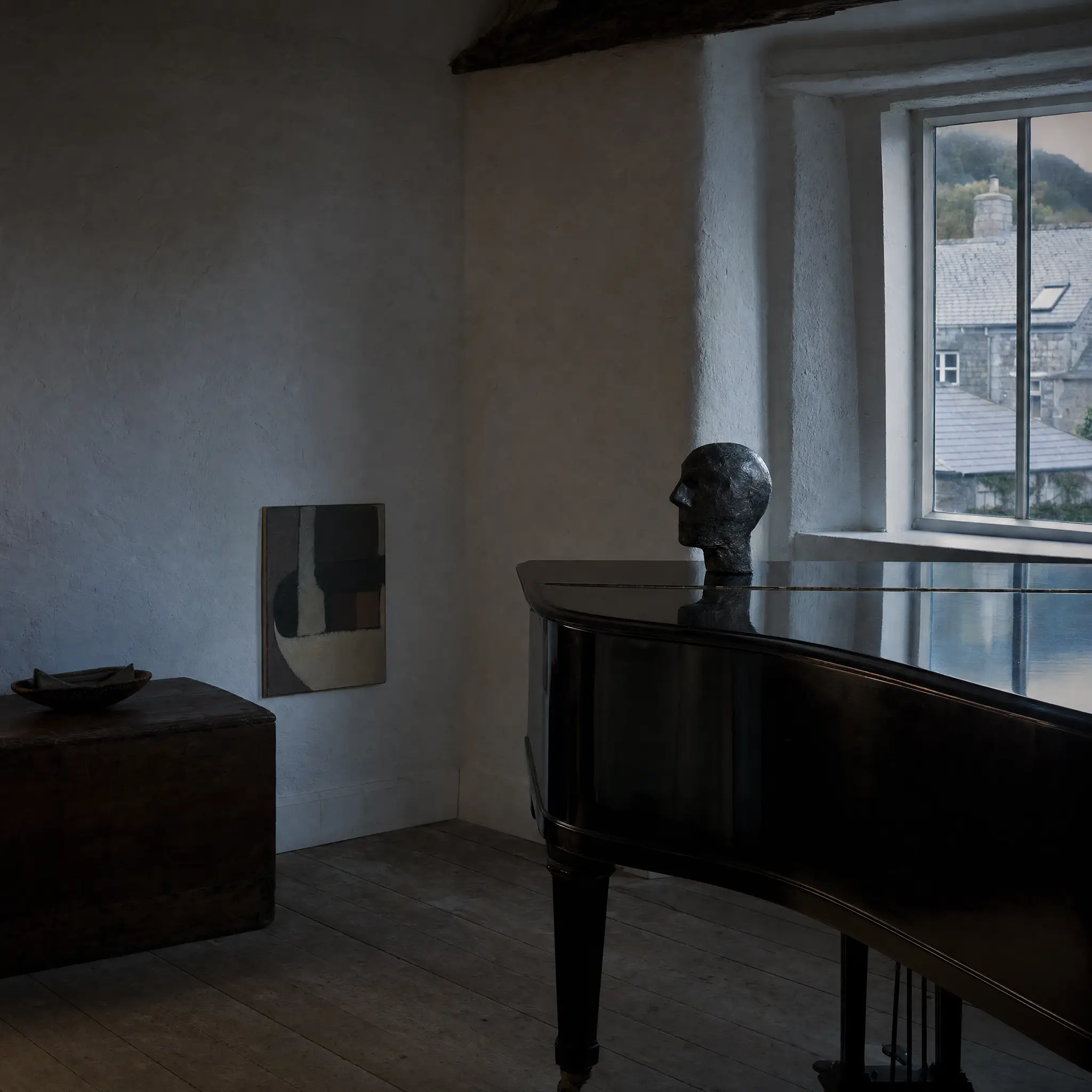 The upstairs sitting room, a grand piano lid catching the last of the window light