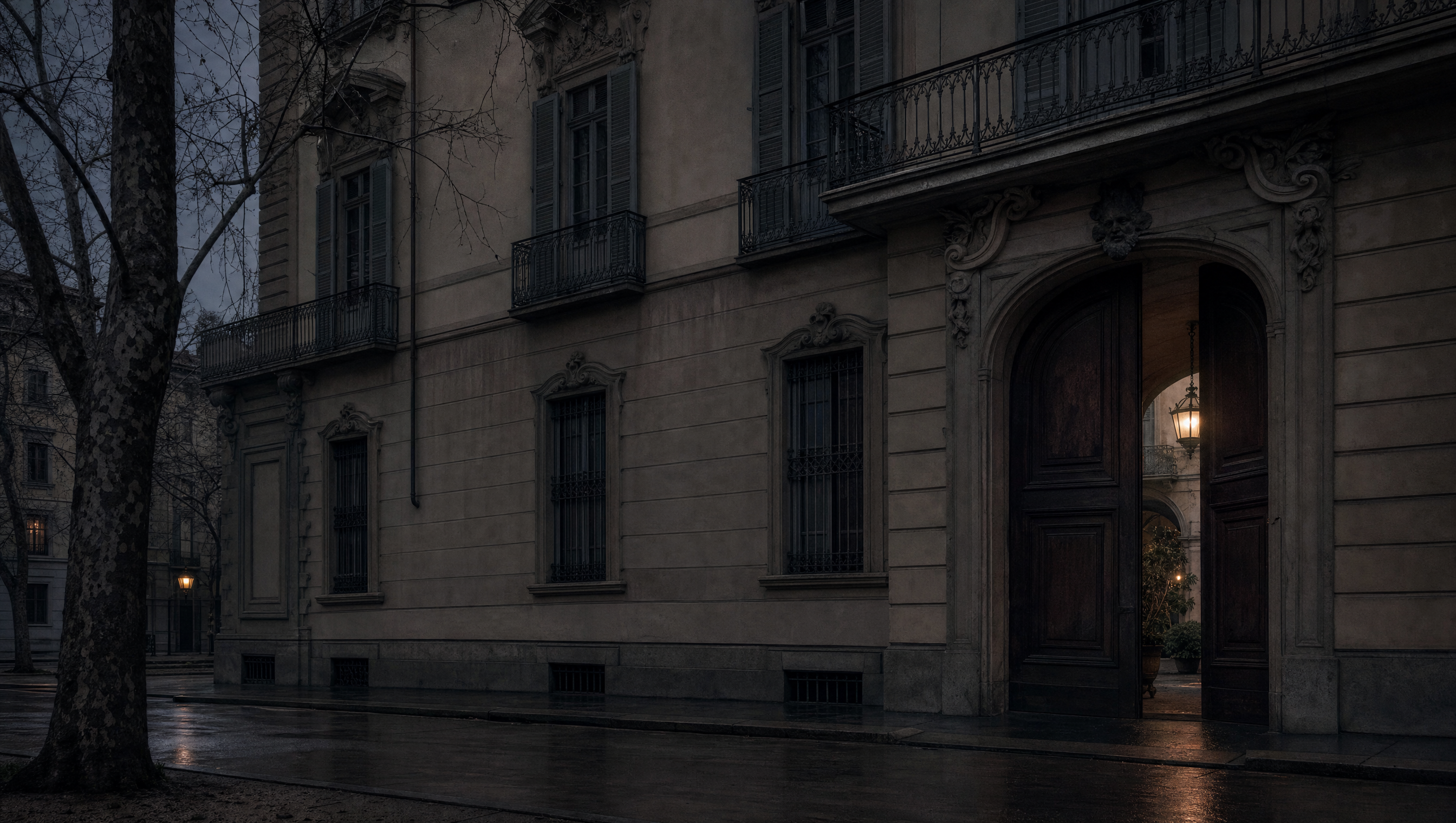 The neoclassical facade of the Poldi Pezzoli palazzo on Via Manzoni at dusk, carriage door ajar on a lit courtyard