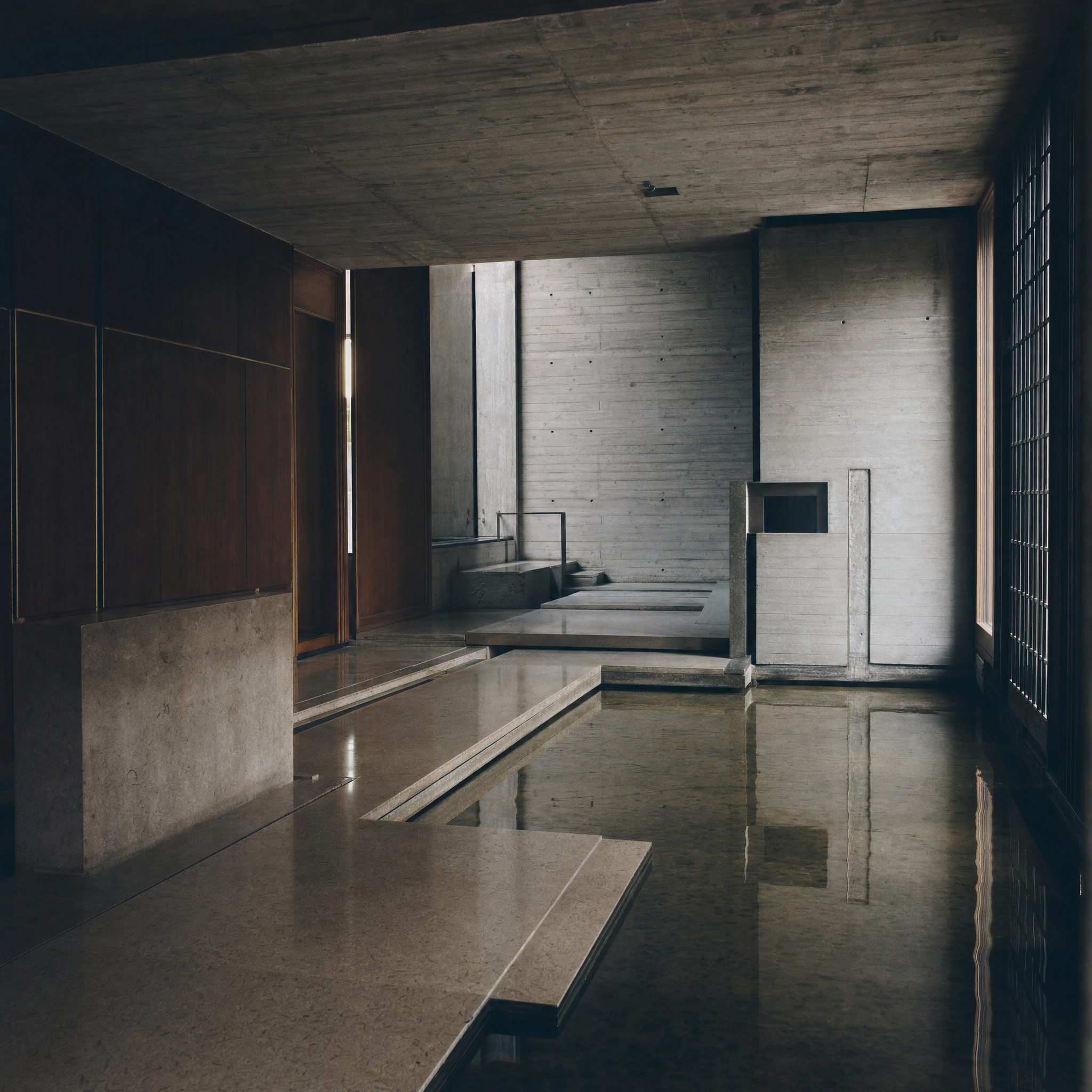 Scarpa's ground-floor hall, Istrian stone channels and raised walkways above still lagoon water