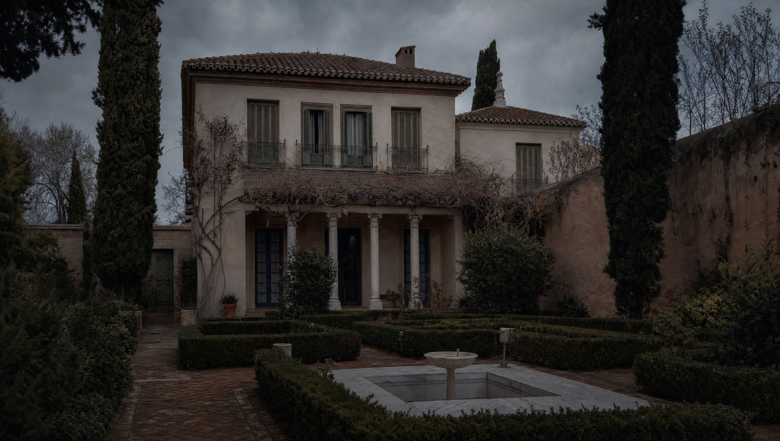 The garden facade of the Sorolla house in Chamberí, seen across its walled Andalusian garden on a winter evening
