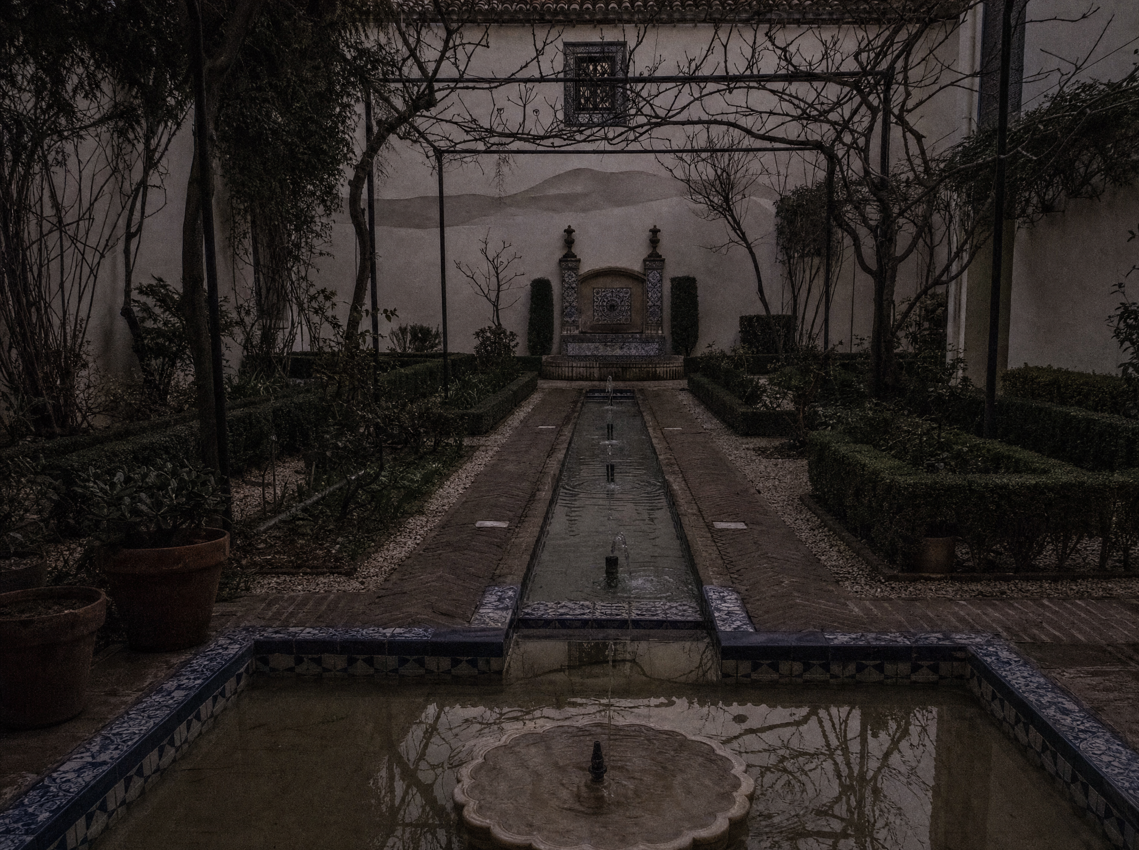 The neo-Moorish second garden: a narrow central watercourse, small jets and tiled basins