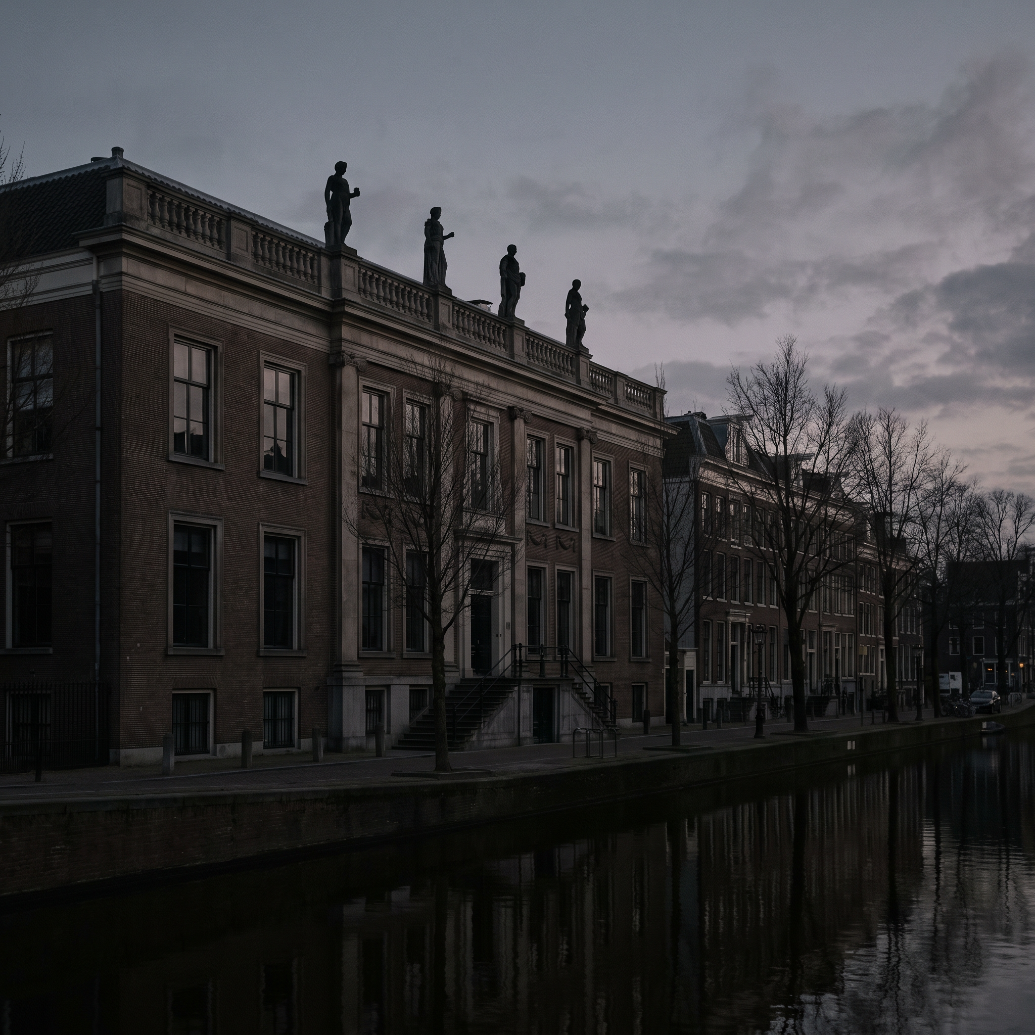 The canal front, statues along the roofline